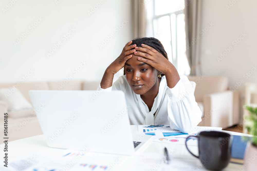 Confused businesswoman annoyed by online problem, spam email or fake internet news looking at laptop, female office worker feeling shocked about stuck computer, bewildered by scam message or virus Confused businesswoman annoyed by online problem, spam email or fake internet news looking at laptop, female office worker feeling shocked about stuck computer, bewildered by scam message or virus