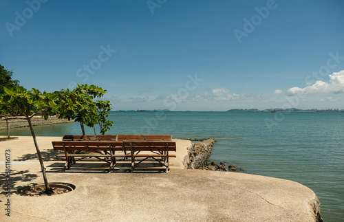 empty bench on sea beach © Igarts