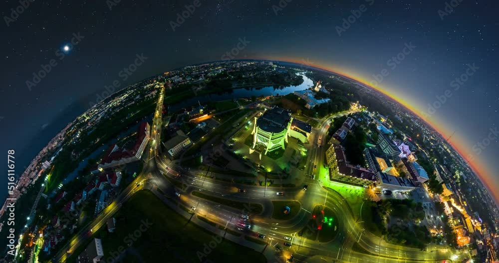 circular rotation with twisting of night landscape of city from the height of flight into tiny planet