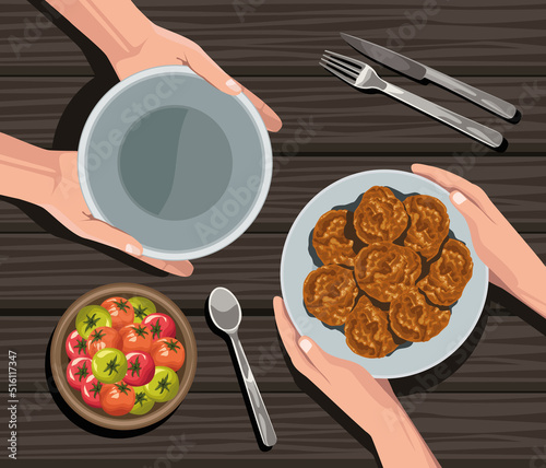 hands with cookies and tomatoes