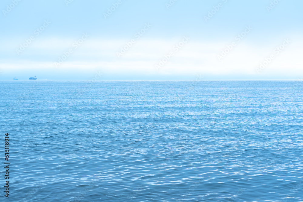Nature background with blue sea against cloudy sky Nature background with blue sea against cloudy sky