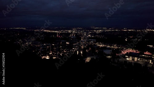 Wallpaper Mural Night drone aerial footage of Simon Fraser University, Vancouver, BC, city lights, university campus. 4K 24FPS H.265 Torontodigital.ca