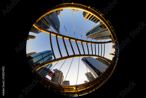 Special fisheye view, circle image of Chong Nonsi interchange MRT station with BRT in the evening, Bangkok, Thailand.