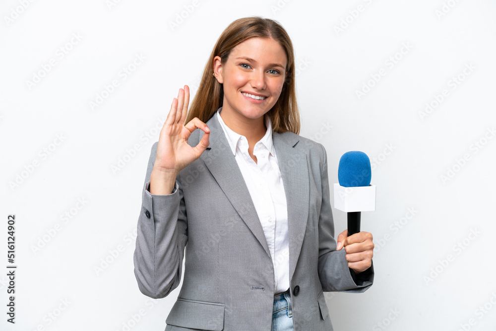 Young caucasian tv presenter woman isolated on white background showing ok sign with fingers Young caucasian tv presenter woman isolated on white background showing ok sign with fingers