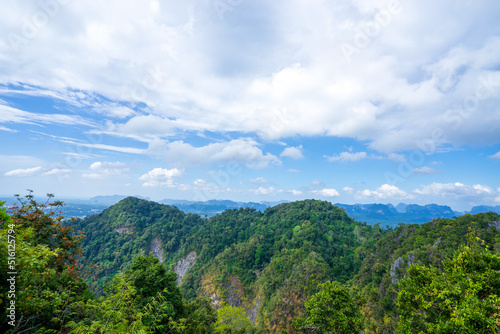 mountains with sky and clouds as seen from Tiger Cave Temple (Wat Tham Sua) in Krabi, Thailand.