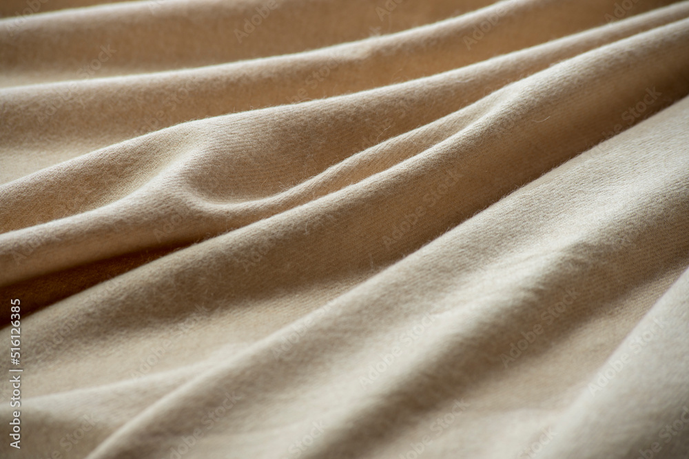 background from natural fabrics. cozy fabrics in pastel and autumn shades with texture and light defocus for the background background from natural fabrics. cozy fabrics in pastel and autumn shades with texture and light defocus for the background