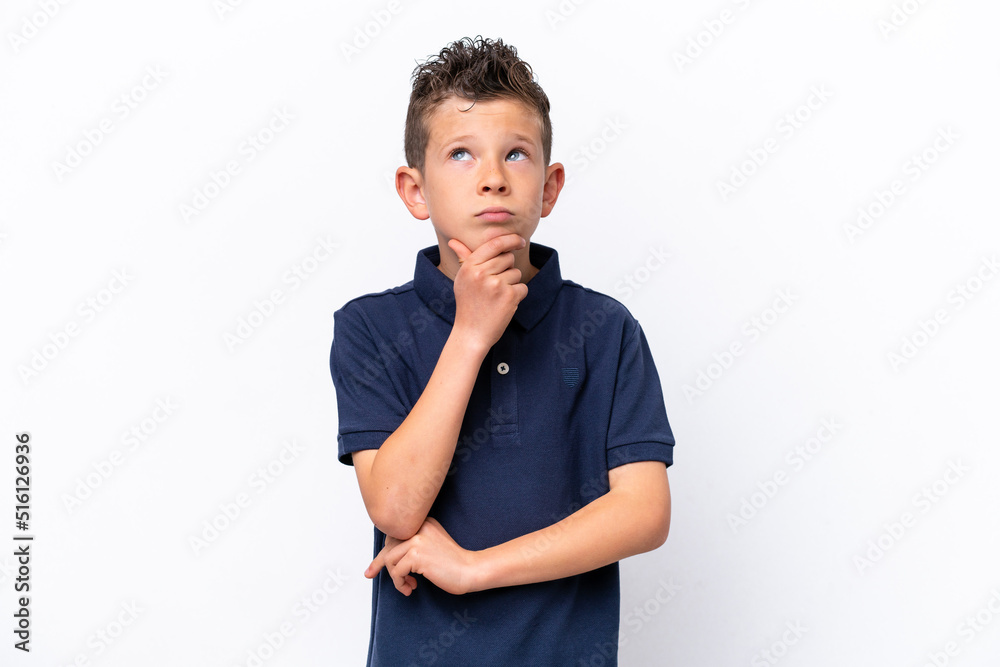 Little caucasian boy isolated on white background having doubts Little caucasian boy isolated on white background having doubts