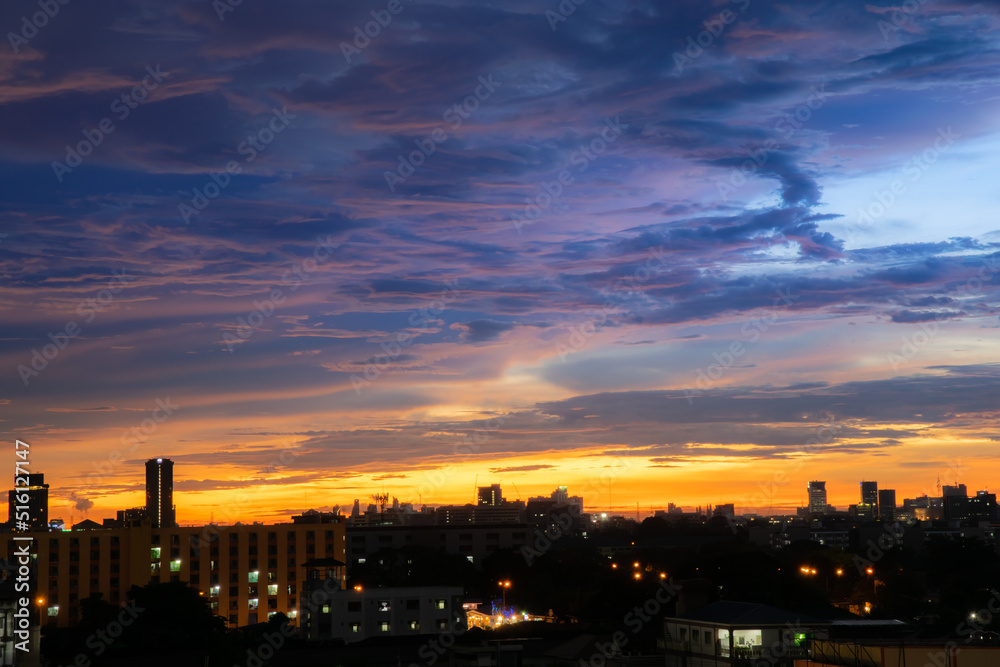 The colorful sky at sunset during twilight after the rain, gives a dramatic feeling, a bird-eye view of the city at twilight, a beautiful sky with clouds,Sky background with clouds,Nature abstract.