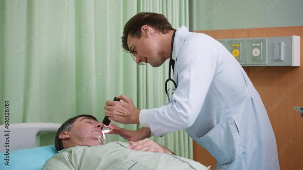 Expertise doctor and Afican American black female nurse taking care of senior patient man while discussing about medical healthcare and medicine in hospital Expertise doctor and Afican American black female nurse taking care of senior patient man while discussing about medical healthcare and medicine in hospital