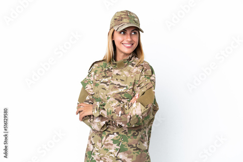 Military woman isolated on white background with arms crossed and happy