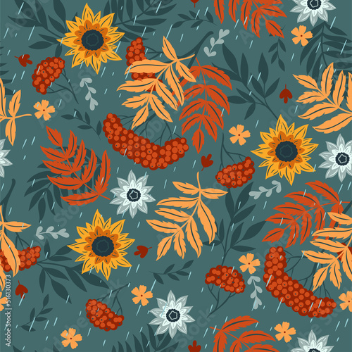 Seamless pattern with autumn leaves, flowers and rowan berries. Vector graphics.