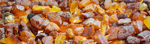 Baltic amber with visible details. background or textura