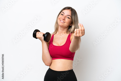 Young sport Rumanian woman making weightlifting isolated on white background making money gesture