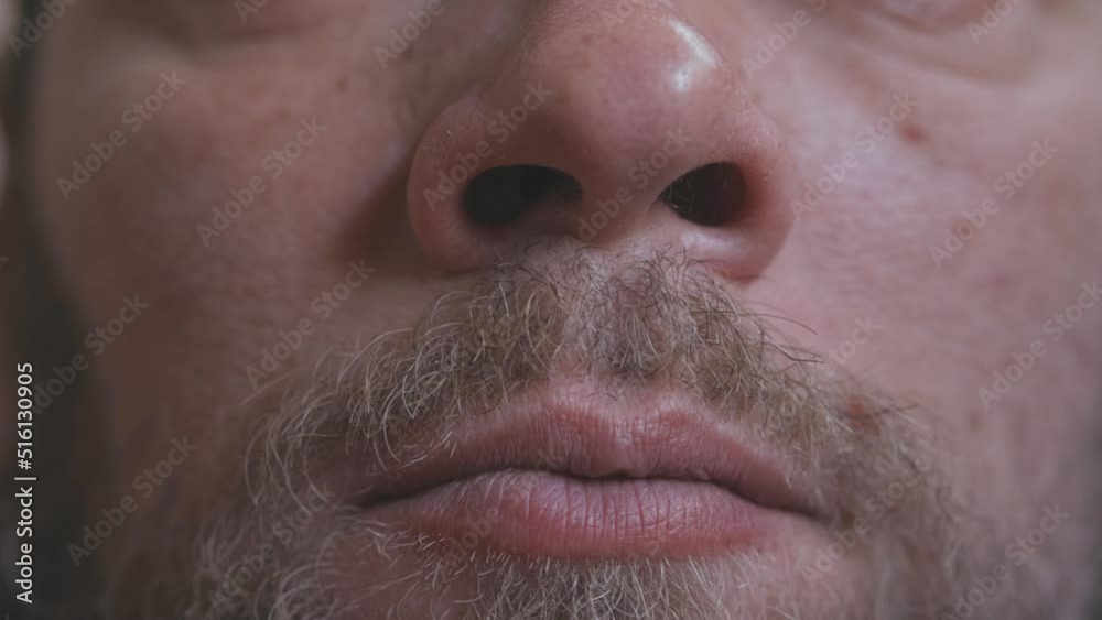 male face close-up, lips, cheeks and beard male face close-up, lips, cheeks and beard