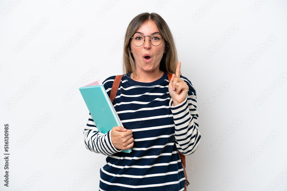 Young student Rumanian woman isolated on white background intending to realizes the solution while lifting a finger up Young student Rumanian woman isolated on white background intending to realizes the solution while lifting a finger up