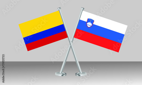 Crossed flags of Colombia and Slovenia. Official colors. Correct proportion. Banner design
