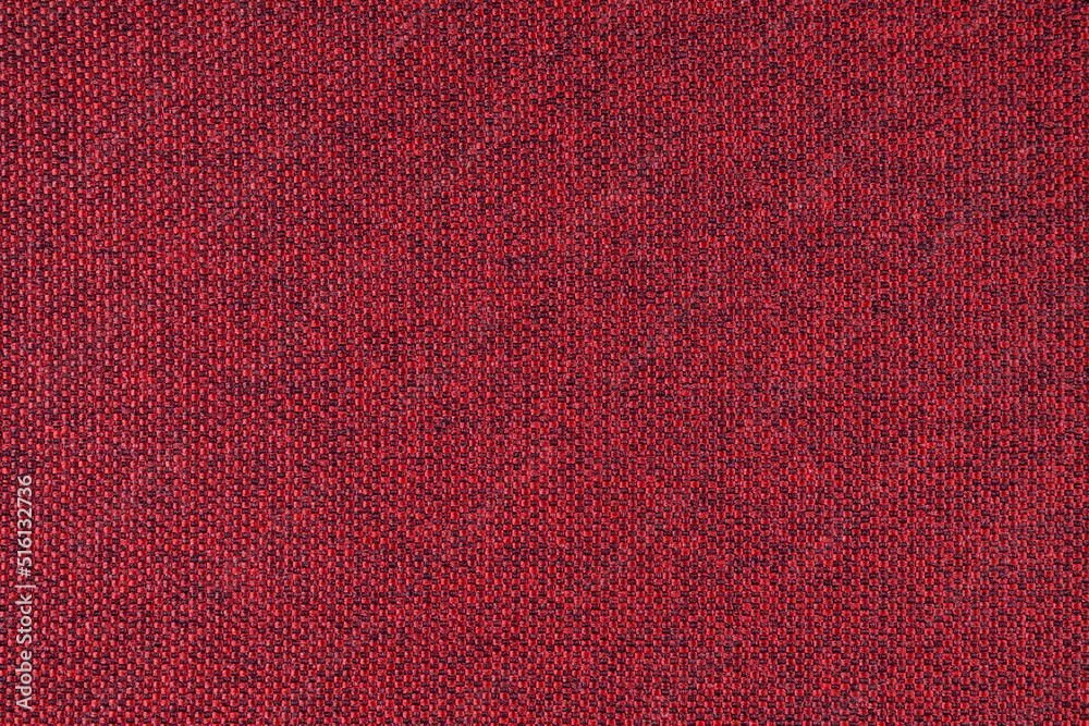 Fototapeta premium Close-up texture of natural red coarse weave fabric or cloth. Fabric texture of natural cotton or linen textile material. Blue canvas background. Decorative fabric for upholstery, furniture, walls