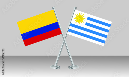 Crossed flags of Colombia and Uruguay. Official colors. Correct proportion. Banner design
