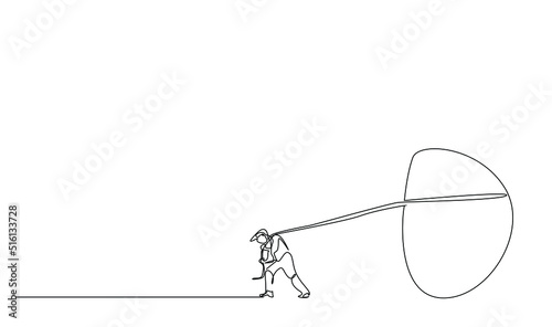 a strong-willed man is trying to pull a big boulder