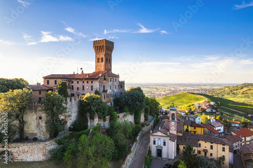 Aerial view of Cigognola Castle with his vineyard in background, Oltrepo Pavese, Pavia, Lombardy, Italy photo