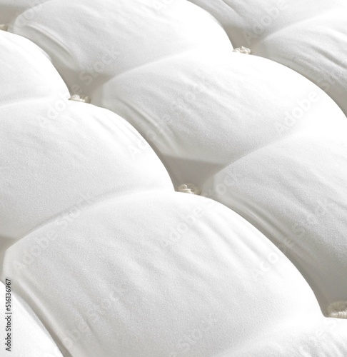 Top view hand made mattress , close up mattress with , background of comfortable bed , quilted white fabric .