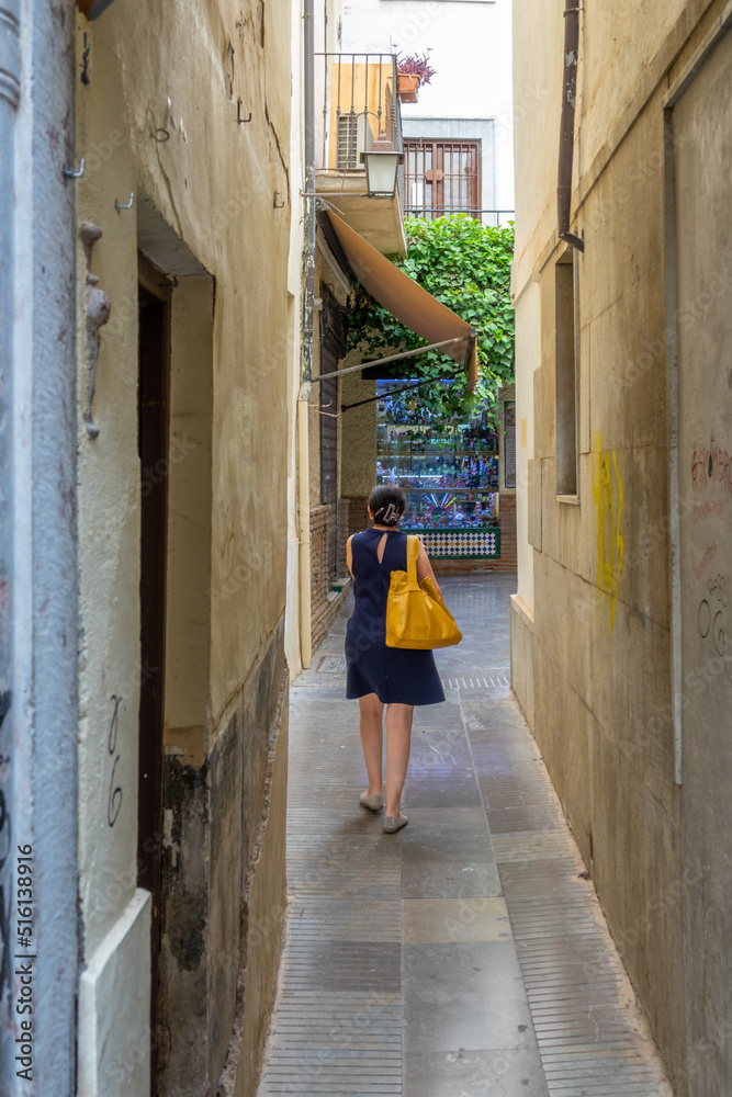 Alcaicería de Granada, narrow street with Moorish bazaars of clothing and crafts
