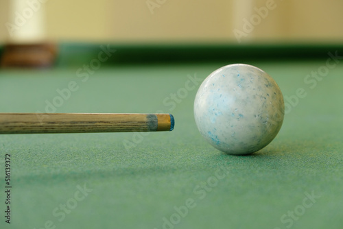 Snooker cue with white snooker ball old