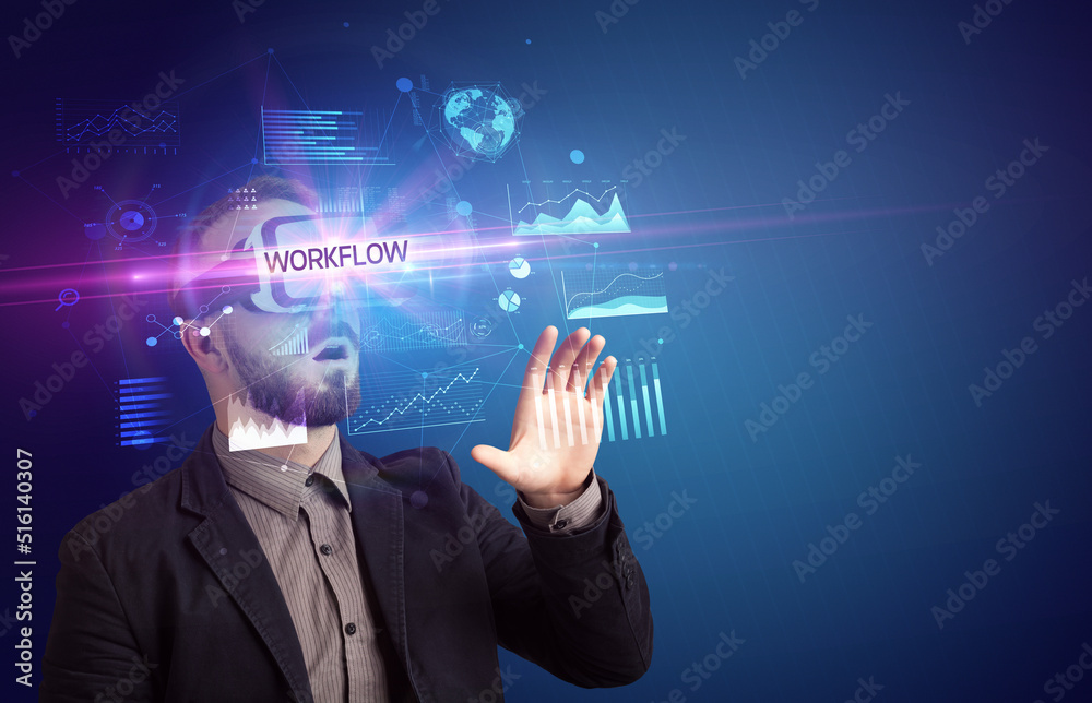 Businessman looking through Virtual Reality glasses Businessman looking through Virtual Reality glasses