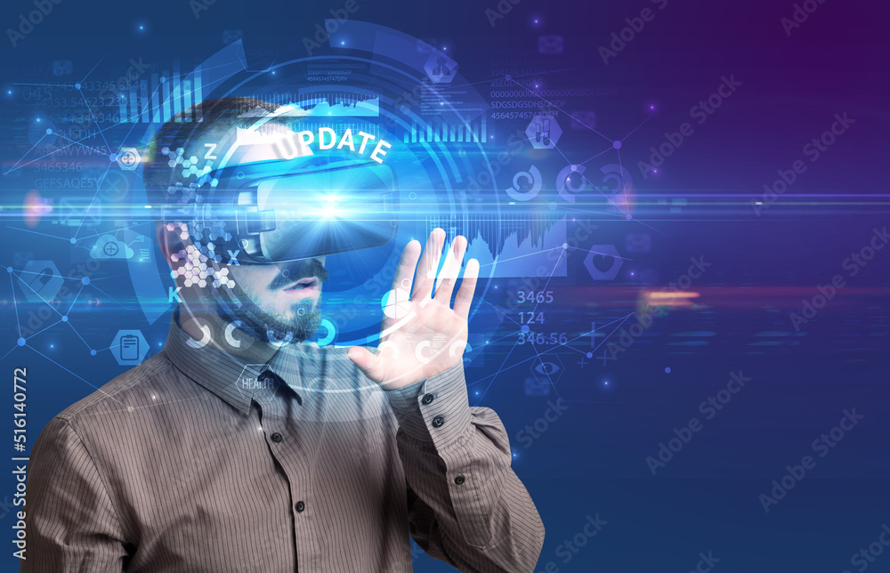 Businessman looking through VR glasses Businessman looking through VR glasses