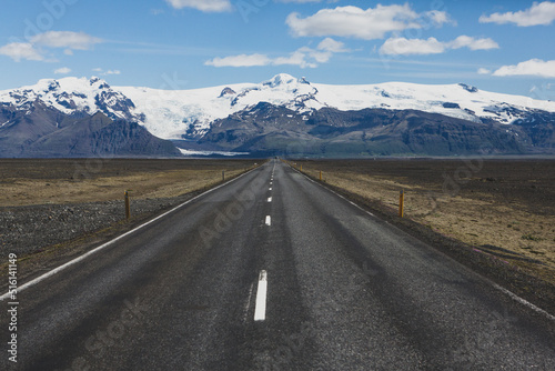 Very picturesque empty road in iceland in summer. Asphalt road as a symbol of freedom and travel. © romeof