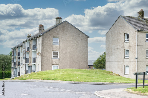 Fototapeta Naklejka Na Ścianę i Meble -  Derelict council house in poor housing estate slum with many social welfare issues in Port Glasgow