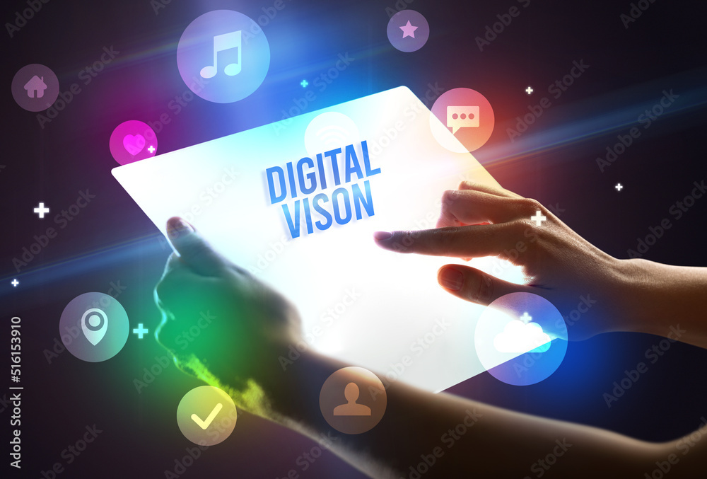 Holding futuristic tablet, new media concept Holding futuristic tablet, new media concept