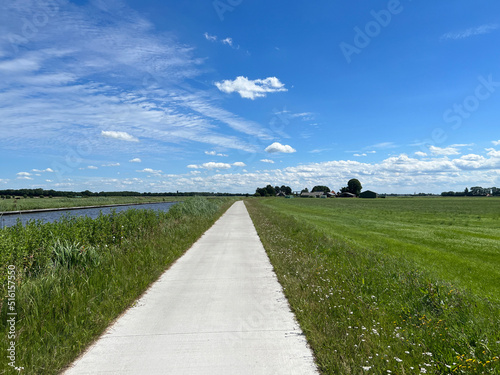 Bicycle path next to a canal around Steenwijkerwold