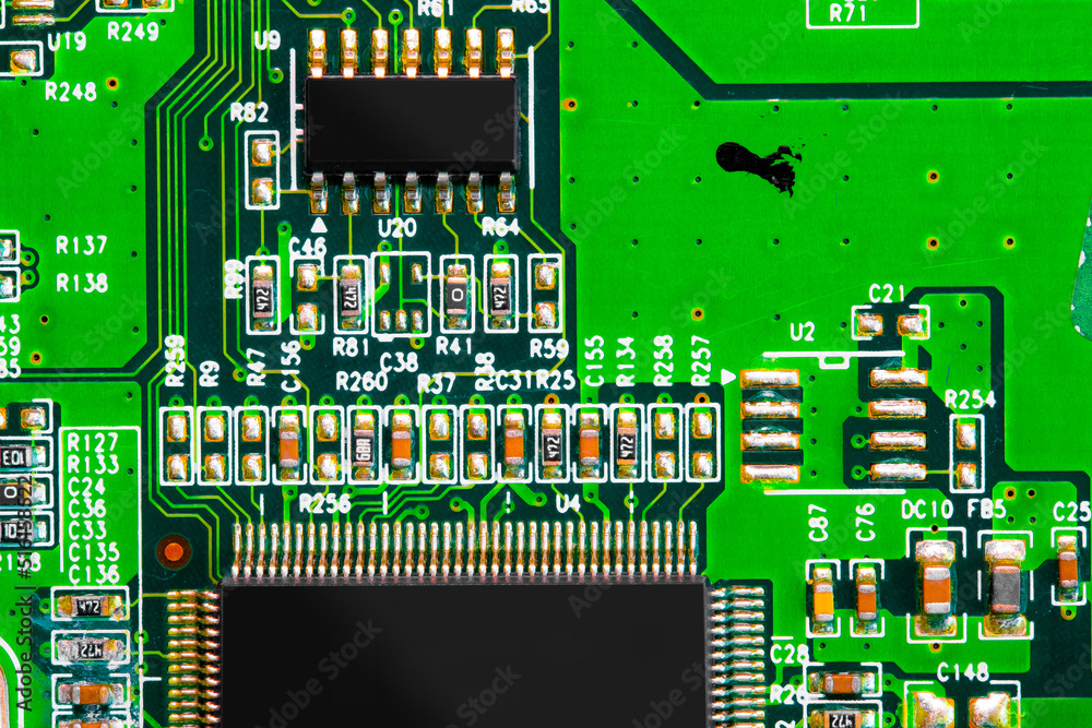 Close up of components and microchips on PC circuit board. Close up of components and microchips on PC circuit board.