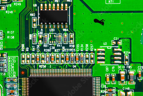 Close up of components and microchips on PC circuit board.