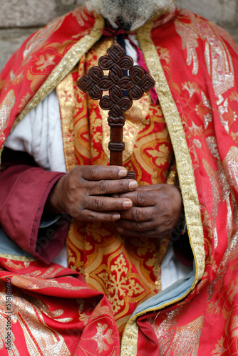 Coptic orthodox priest holding a cross