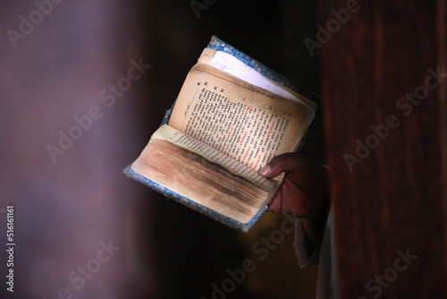 Bible reading in Bet Maryam church, Lalibela photo