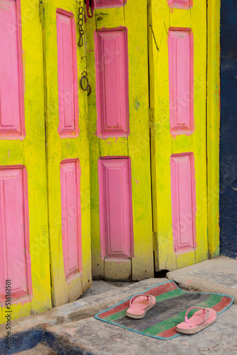 Bright colors of Indian street. Entrance door of an Indian house.