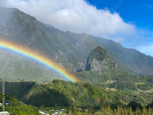 Beautiful rainbow over Cilaos city in Reunion island