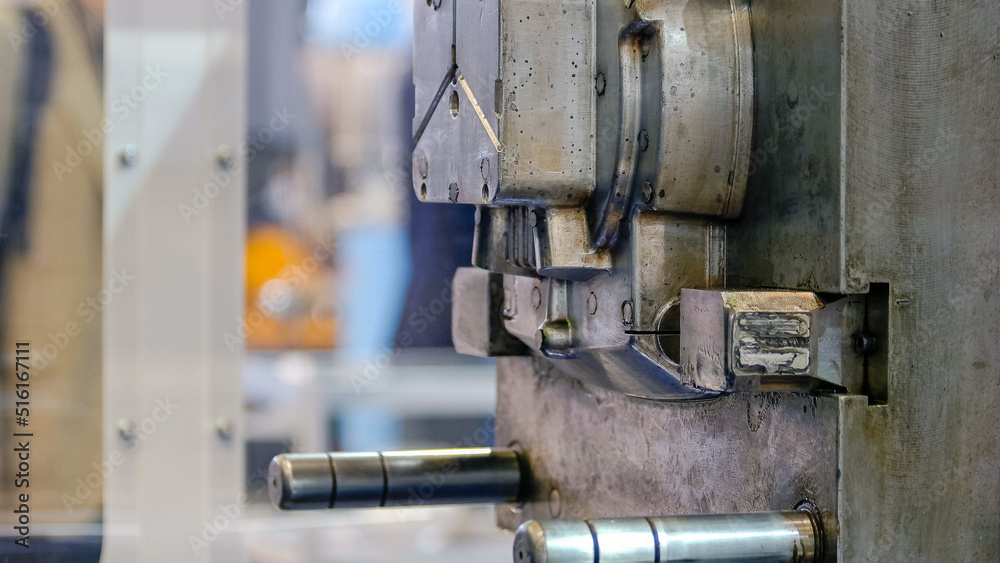 Close-up of large industrial metal factory machine motion. Moving back and forth.