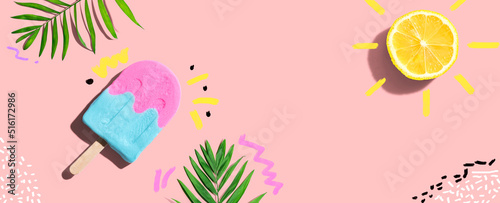 Summer concept with lemon sunlight with a popsicle - flat lay
