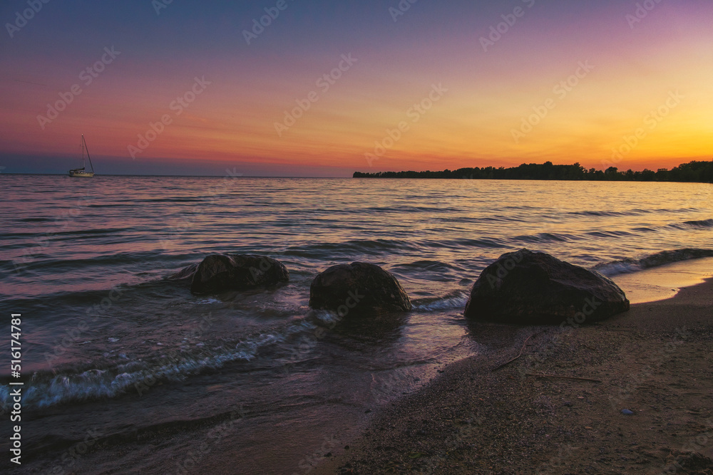 Sandbanks Provincial Park Ontario Canada with beautiful sunset landscapes, large bodies of water, waves, and stunning nature scenics