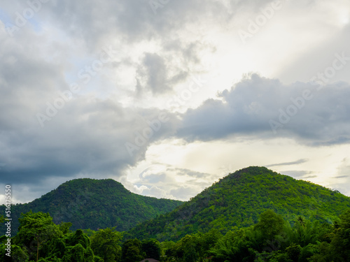 Beautiful landscape of green forest mountain view and tropical rain-forest with clouds after raining in the morning. Green nature earth and ecology.