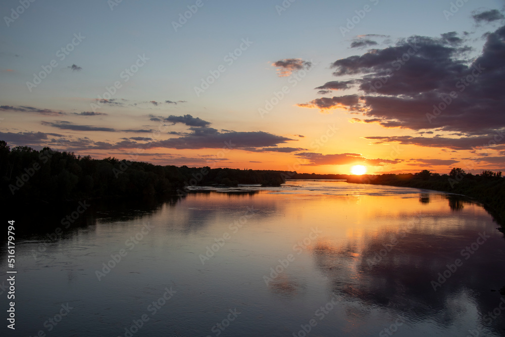 sunset over the river in summer 