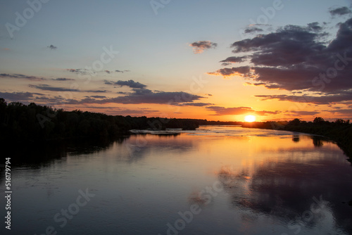 sunset over the river in summer 