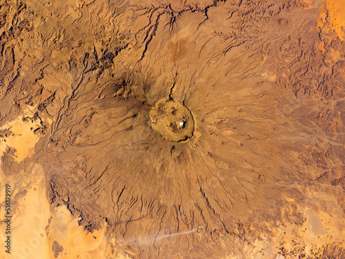 Top view of Emi Koussi Volcano, Chad, the highest of Africa’s Sahara region. Aerial view of a inactive volcanic peak. Elements of this image furnished by NASA. photo