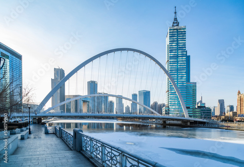 Winter scenery of Tianjin bridge and buildings