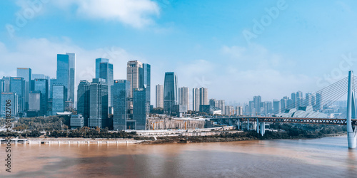 High angle sunny day scenery of urban buildings of Qiansimen Bridge in Chongqing, China
