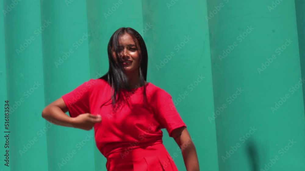 Latin woman dancing in the street Latin woman dancing in the street