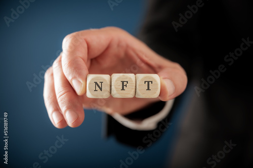 NFT spelled on wooden dice